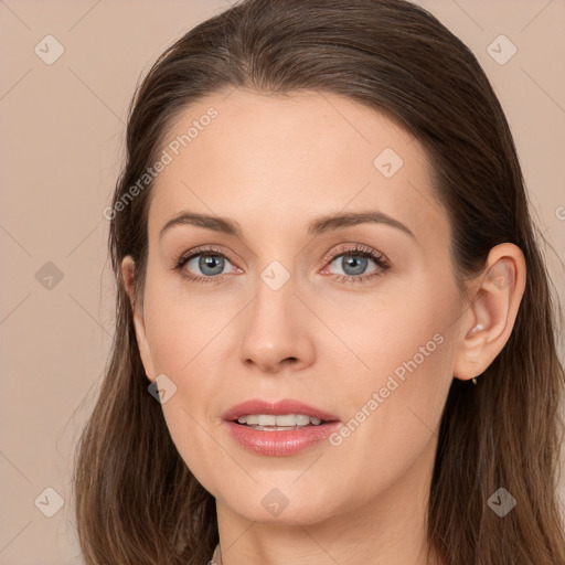 Joyful white young-adult female with long  brown hair and grey eyes