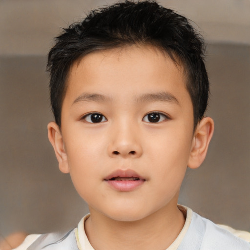 Neutral asian child male with short  brown hair and brown eyes