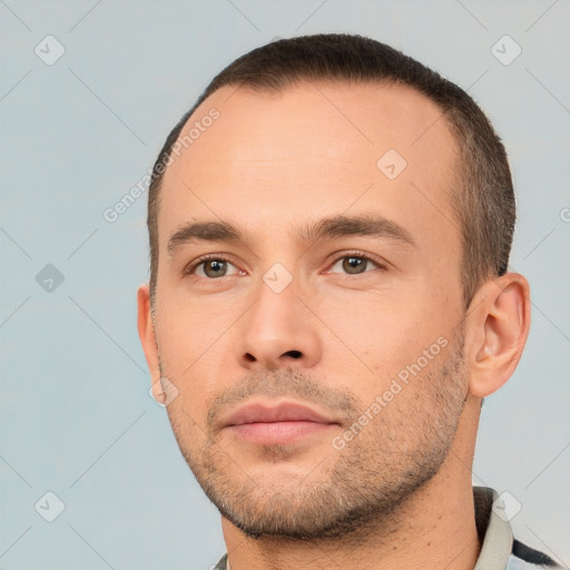 Neutral white young-adult male with short  brown hair and brown eyes