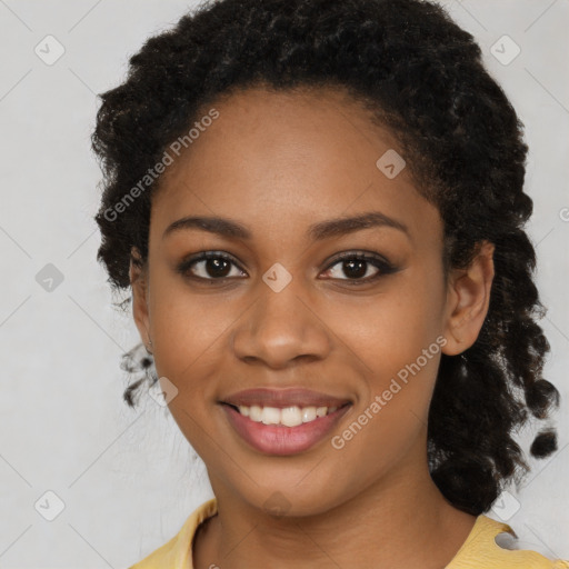 Joyful black young-adult female with medium  black hair and brown eyes