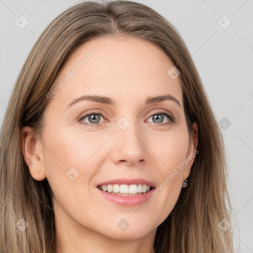 Joyful white young-adult female with long  brown hair and grey eyes