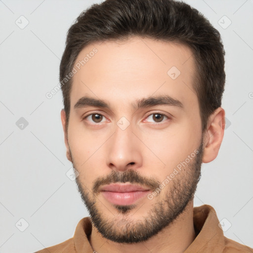 Neutral white young-adult male with short  brown hair and brown eyes