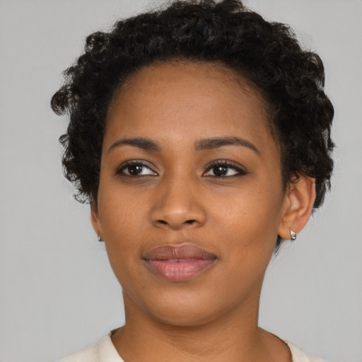 Neutral black young-adult female with short  black hair and brown eyes