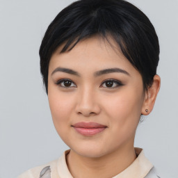 Joyful asian young-adult female with medium  black hair and brown eyes