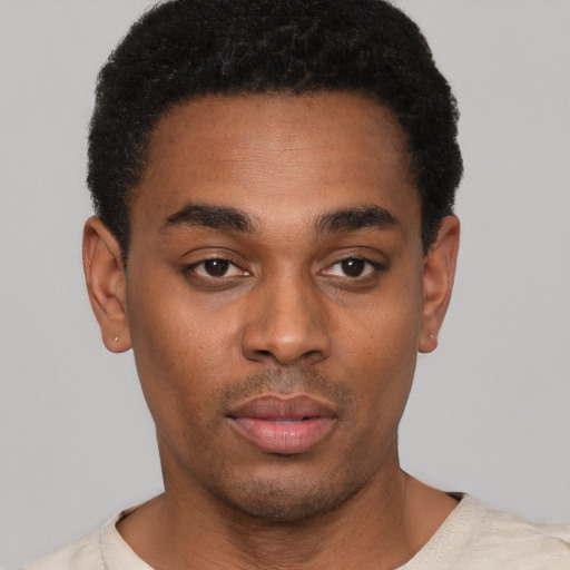 Neutral black young-adult male with short  black hair and brown eyes