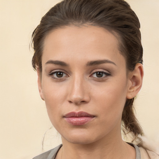 Neutral white young-adult female with medium  brown hair and brown eyes