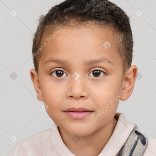 Joyful white child male with short  brown hair and brown eyes