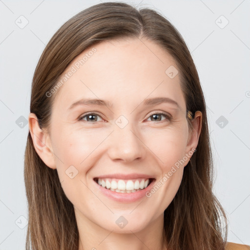 Joyful white young-adult female with long  brown hair and grey eyes