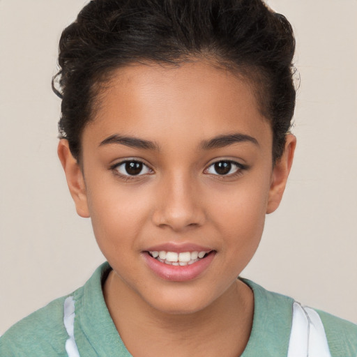 Joyful white child female with short  brown hair and brown eyes