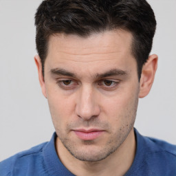 Neutral white adult male with short  brown hair and brown eyes