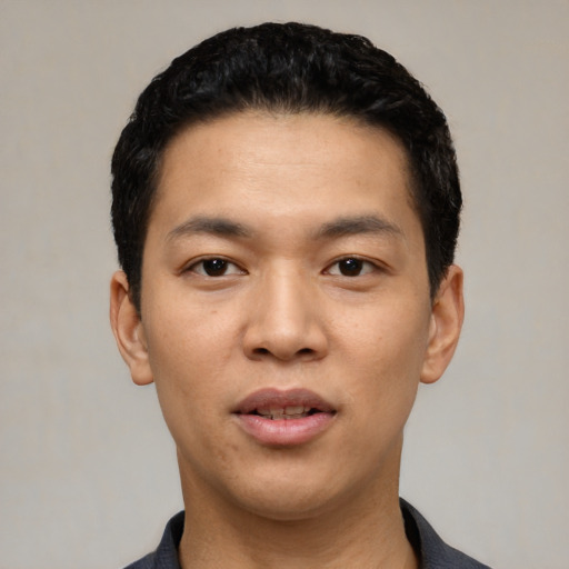 Neutral asian young-adult male with short  black hair and brown eyes