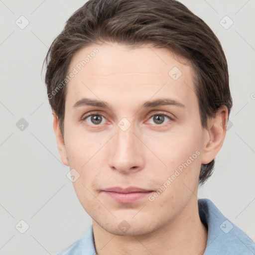 Neutral white young-adult male with short  brown hair and grey eyes