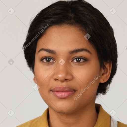 Joyful latino young-adult female with short  brown hair and brown eyes