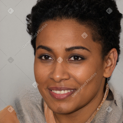 Joyful black young-adult female with short  brown hair and brown eyes