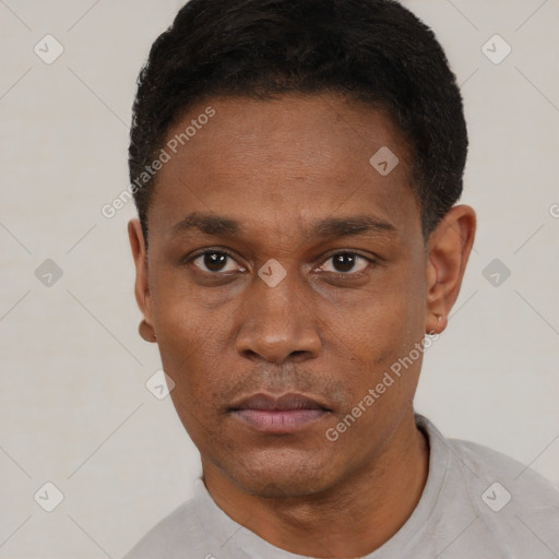 Neutral black young-adult male with short  black hair and brown eyes