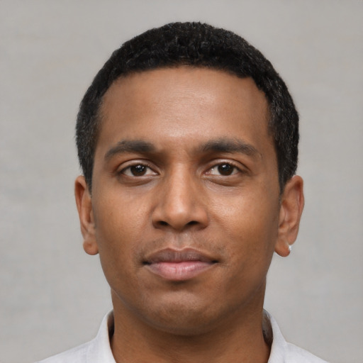 Neutral black young-adult male with short  black hair and brown eyes