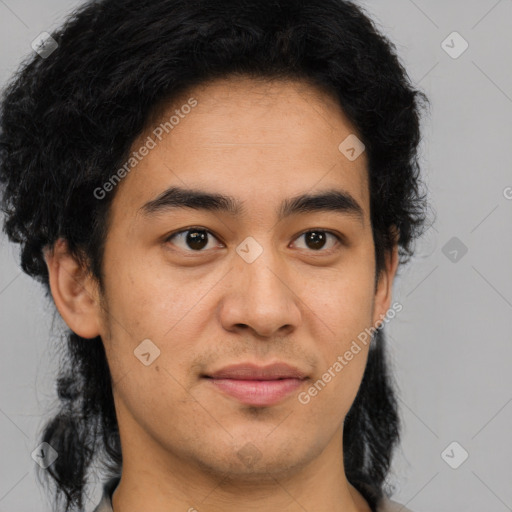 Joyful latino young-adult male with short  brown hair and brown eyes