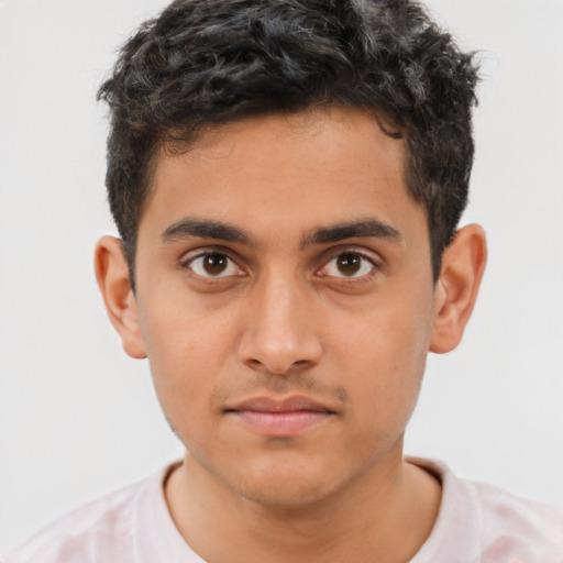 Neutral latino young-adult male with short  brown hair and brown eyes