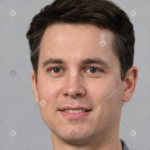 Joyful white young-adult male with short  brown hair and brown eyes