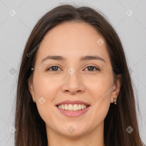 Joyful white young-adult female with long  brown hair and brown eyes