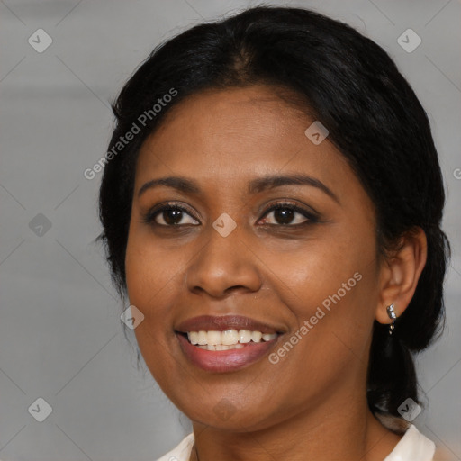 Joyful black young-adult female with medium  black hair and brown eyes