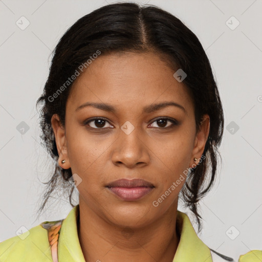 Joyful black young-adult female with medium  brown hair and brown eyes