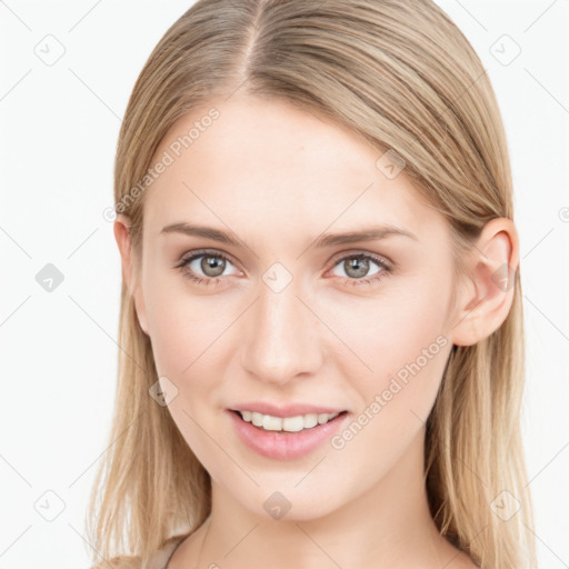 Joyful white young-adult female with long  brown hair and blue eyes