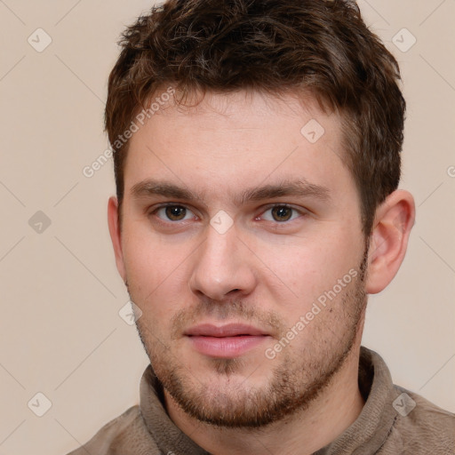 Neutral white young-adult male with short  brown hair and grey eyes