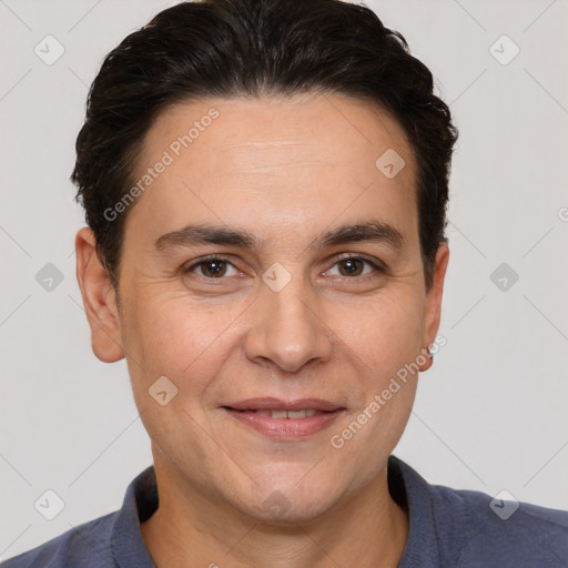 Joyful white adult male with short  brown hair and brown eyes