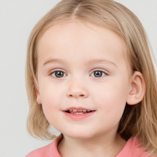 Joyful white child female with medium  brown hair and blue eyes