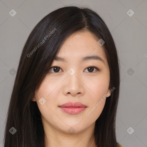 Joyful asian young-adult female with long  brown hair and brown eyes