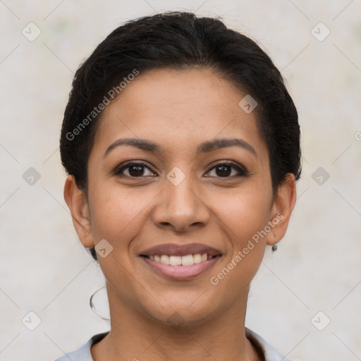 Joyful latino young-adult female with short  brown hair and brown eyes