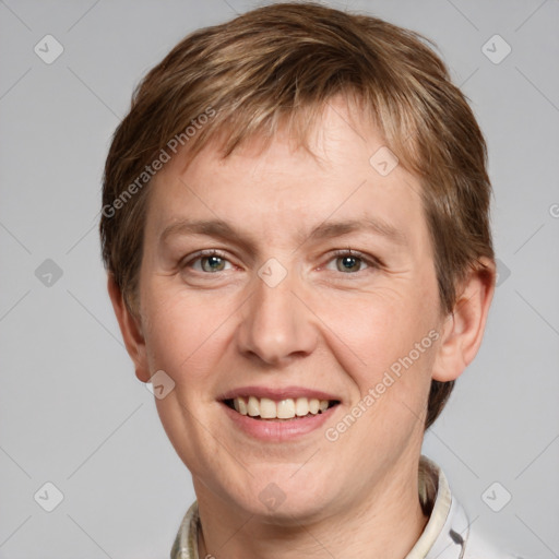 Joyful white adult male with short  brown hair and grey eyes