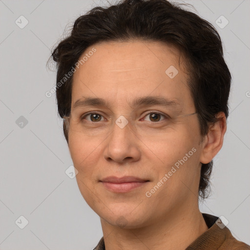 Joyful white adult female with short  brown hair and brown eyes