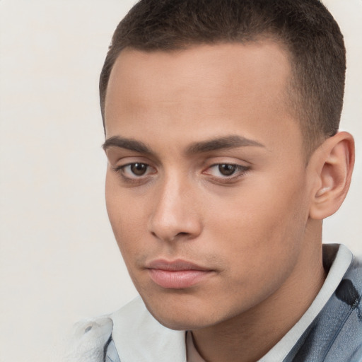 Neutral white young-adult male with short  brown hair and brown eyes