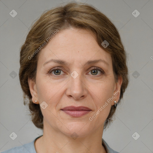 Joyful white adult female with medium  brown hair and grey eyes