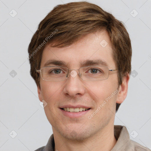 Joyful white adult male with short  brown hair and grey eyes