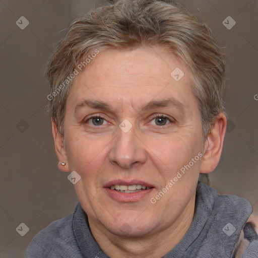 Joyful white middle-aged female with short  brown hair and brown eyes