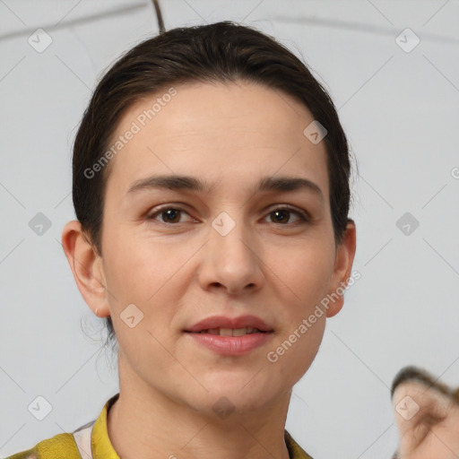 Joyful white young-adult female with short  brown hair and brown eyes