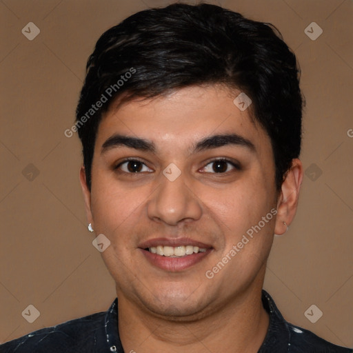 Joyful latino young-adult male with short  black hair and brown eyes