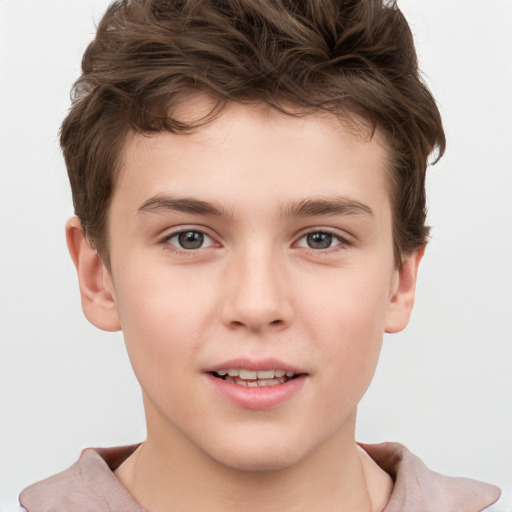 Joyful white child male with short  brown hair and brown eyes