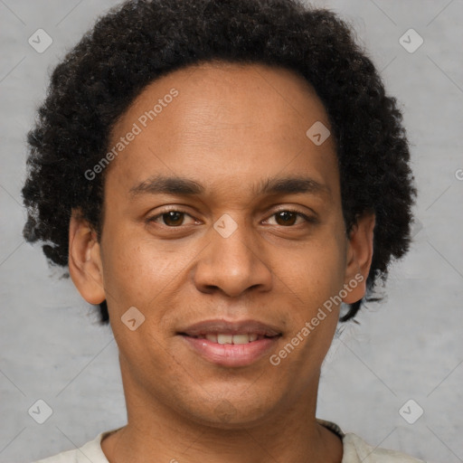 Joyful black young-adult male with short  brown hair and brown eyes