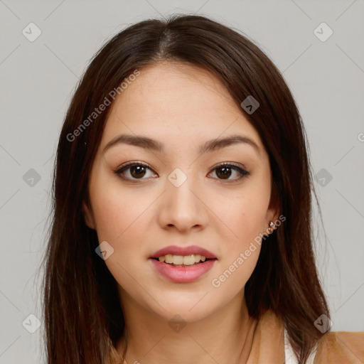 Joyful asian young-adult female with long  brown hair and brown eyes