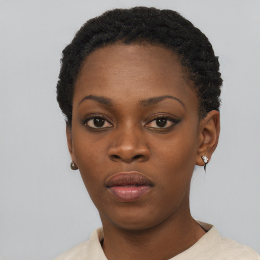 Neutral black young-adult female with short  black hair and brown eyes