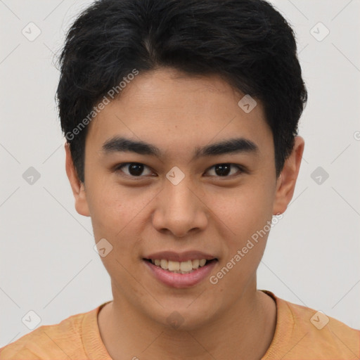 Joyful asian young-adult male with short  brown hair and brown eyes