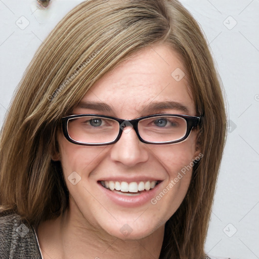 Joyful white young-adult female with medium  brown hair and blue eyes