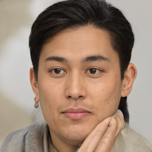 Neutral asian young-adult male with short  brown hair and brown eyes