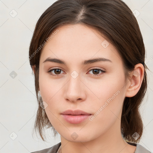 Neutral white young-adult female with medium  brown hair and brown eyes