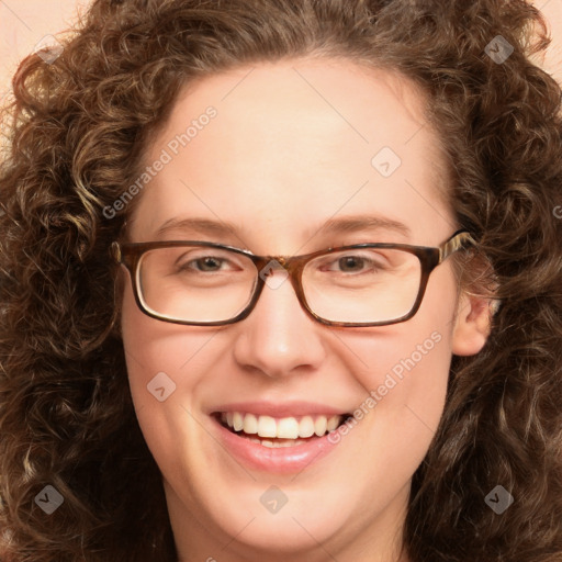 Joyful white young-adult female with long  brown hair and green eyes