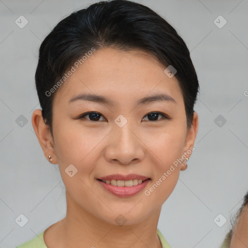 Joyful asian young-adult female with short  brown hair and brown eyes